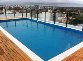UN DORMITORIO, PILETA Y ASADORES EN TERRAZA NUEVA CÓRDOBa